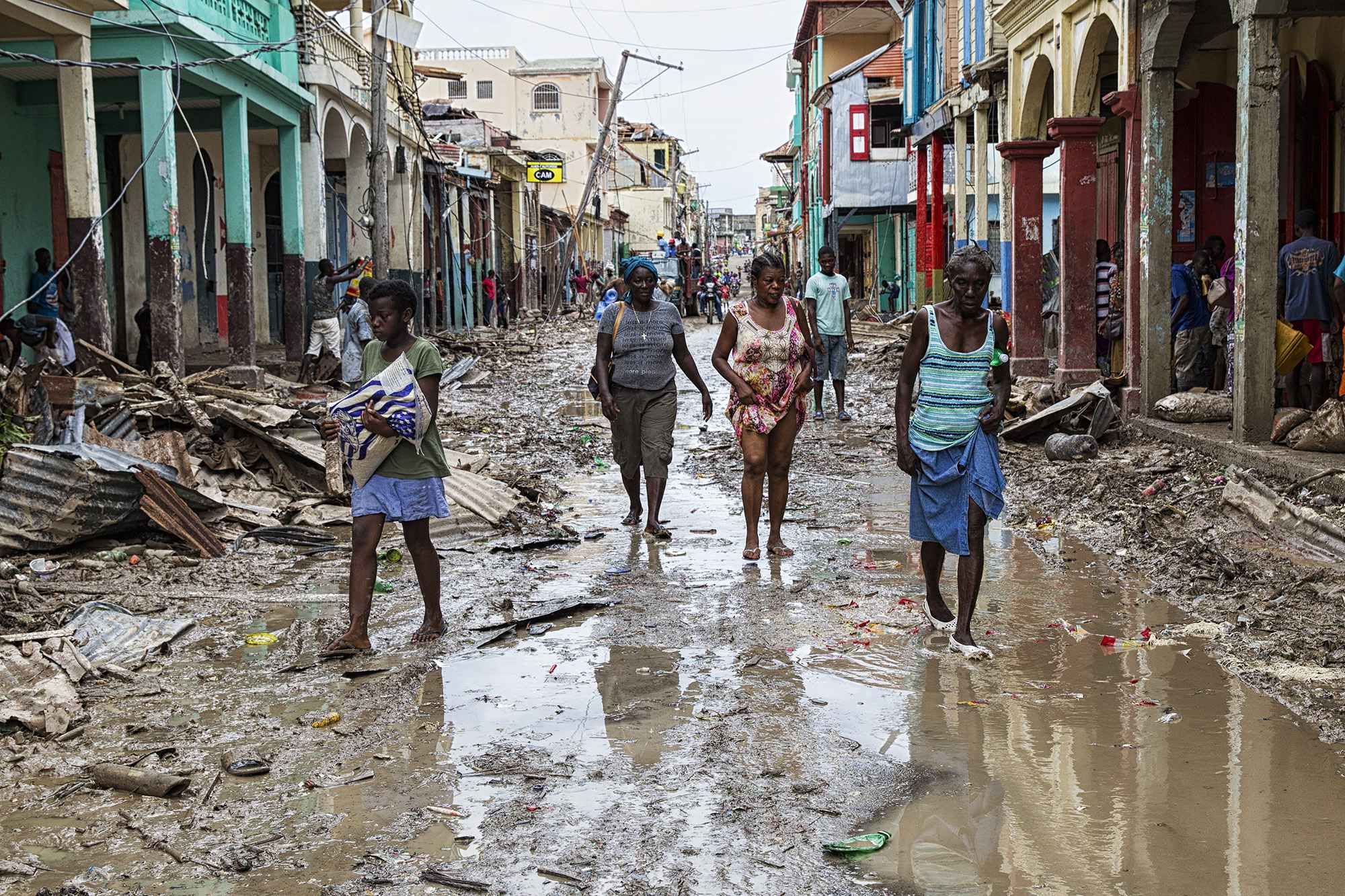 2048x1536-fit_people-walk-along-a-street-in-downtown-jeremie-haiti-thursday-october-6-2016-hurricane-matthew